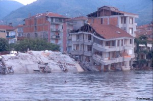 While these buildings are now partly submerged, the collapse of the one building and the near collapse of the other building are illustrative of structural performance throughout Golcuk, and are mainly attributed to the effects of shaking.