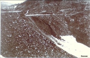 At 9:30 AM on December 23rd, a gully had been eroded across the crest of the dam, and the reservoir began to spill over the top of the fill. When this happened the velocity of flow and the rate of erosion increased rapidly, and soon a major portion of the embankment was washed away and the reservoir was emptied.