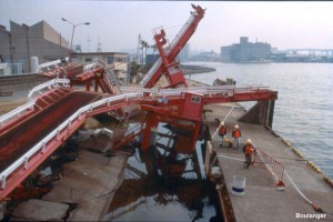 This car ramp at a ferry terminal collapsed when the fill materials liquefied and the quay wall displaced outwards. The graben behind the quay walls is filled with water. 