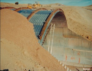  This photo shows the largest culvert structure ever built – a 60-foot span structure in Newfane, New York. It collapsed in 1974, a few days after this photo was taken, after a few feet of fill was placed over the crown of the structure. Fortunately, the failure occurred during the noon hour, when no one was inside the culvert, and there were no deaths or injuries. The investigation of the failure lead to improved design methods.