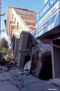 The mat foundation for this building was exposed when it overturned. This building has a relatively large height-to-width ratio, making it more susceptible to overturning failure.